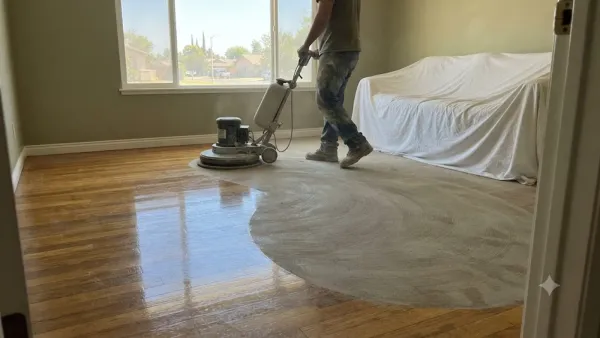 Screen and recoat buffing on a wood floor in a Bakersfield, CA home